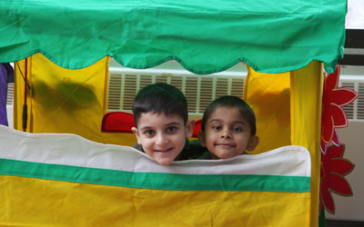 children playing in a material fun house